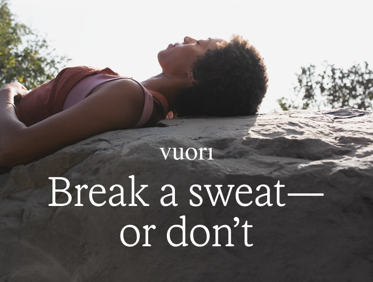 A Vuori-clad woman in repose atop a boulder. Headline: Break a sweat–or don't