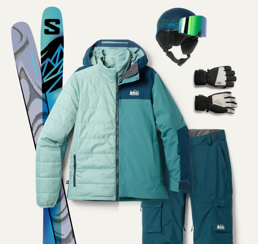 A collage of snowsports gear including skis, a helmet and goggles, a jacket, gloves, and pants.