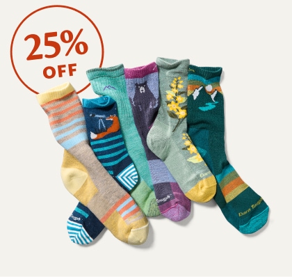 25 percent off. A collage of colorful printed socks.