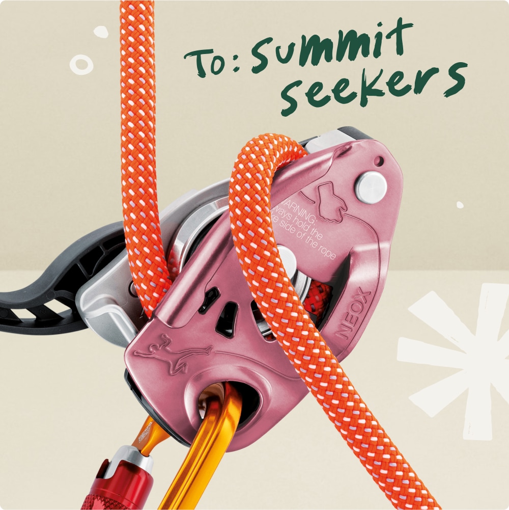 To: Summit seekers. A pink NEOX belay device.