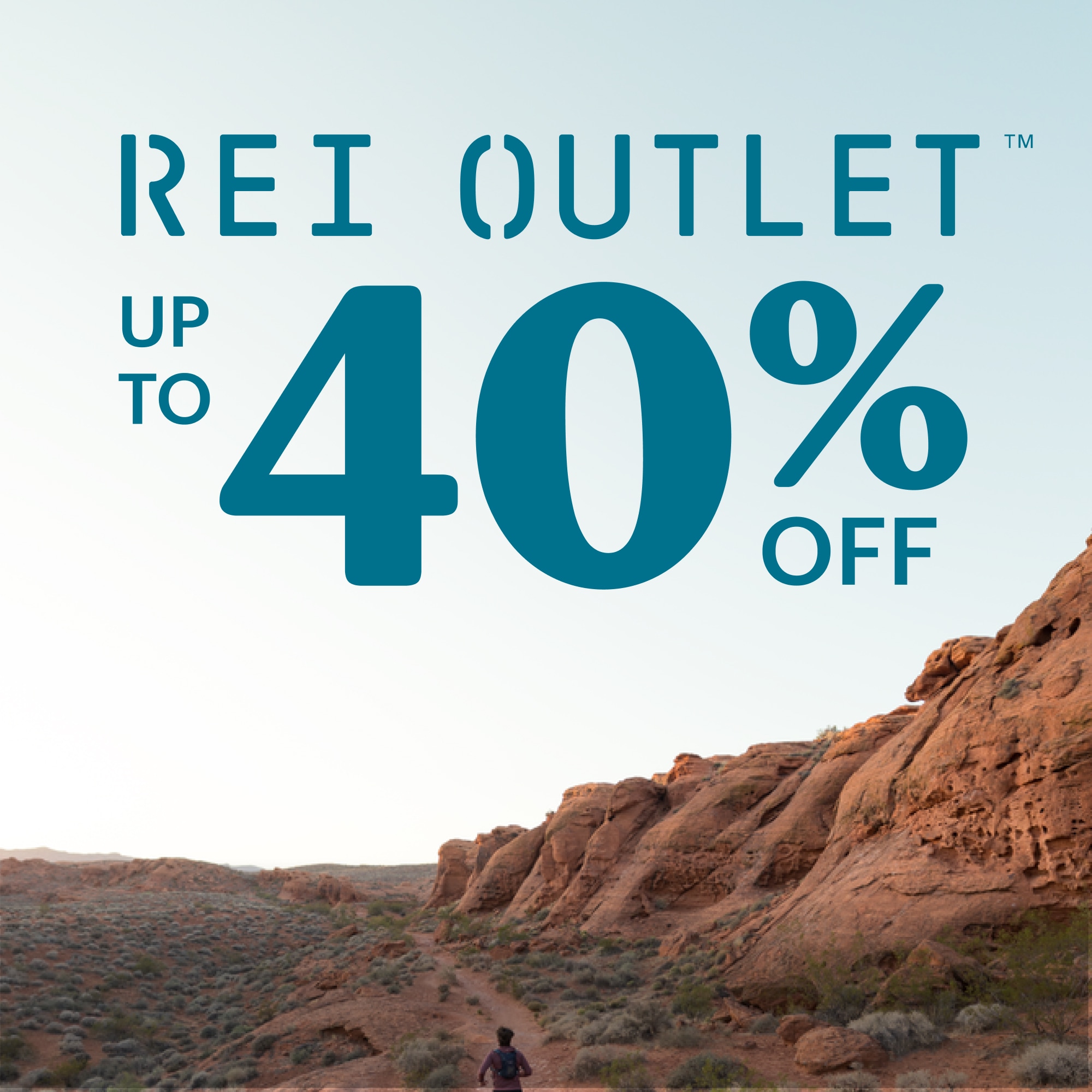 Up to 40% off R E I Outlet. A person runs through a desert trail.