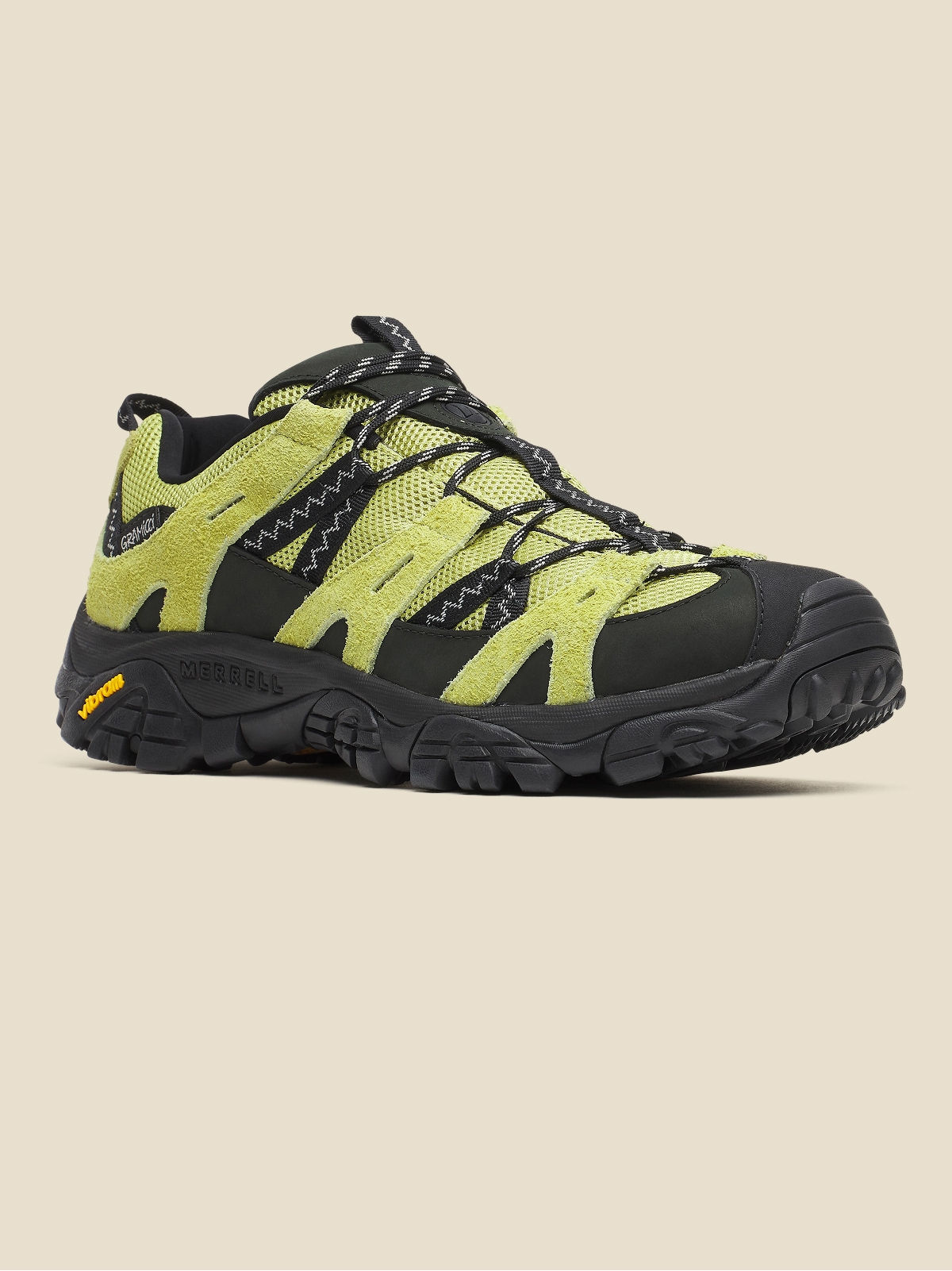 A Merrell Moab 2 Siren x Gramicci hiking shoe on a light colored background.