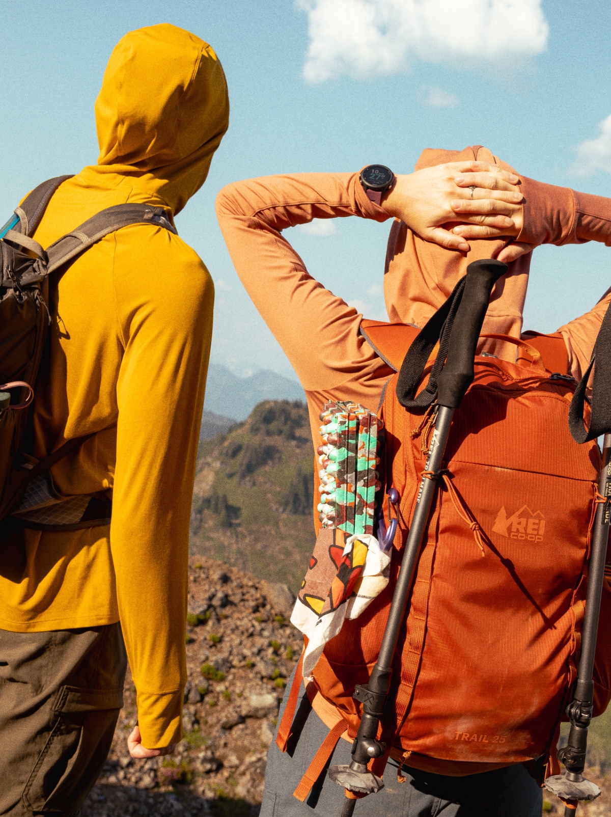 Two people stop to take in the view while on a hike.