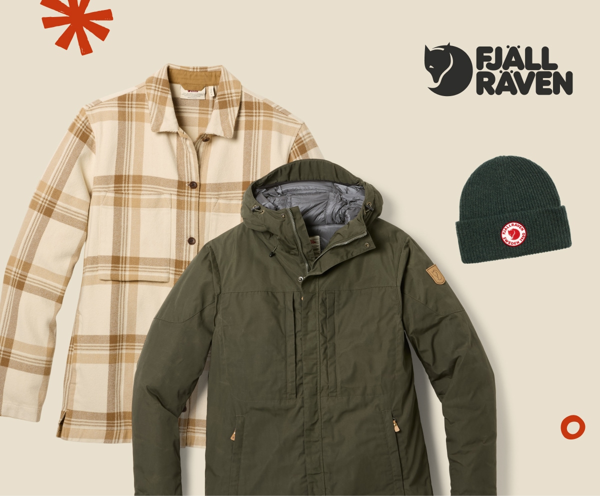 A jacket, a flannel, and a hat from Fjallraven on a light colored background.
