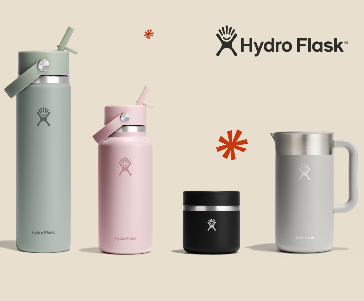 Hydro Flask bottles, a food jar, and a mug over a light colored background.