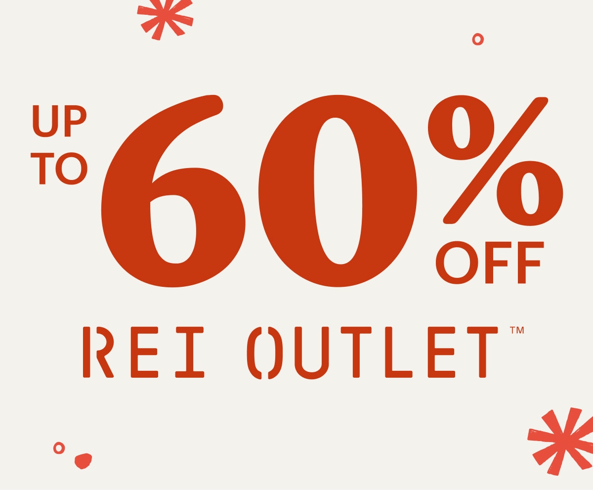 Text reads: Up to 60% off R E I Outlet on a light colored background with snowflakes.