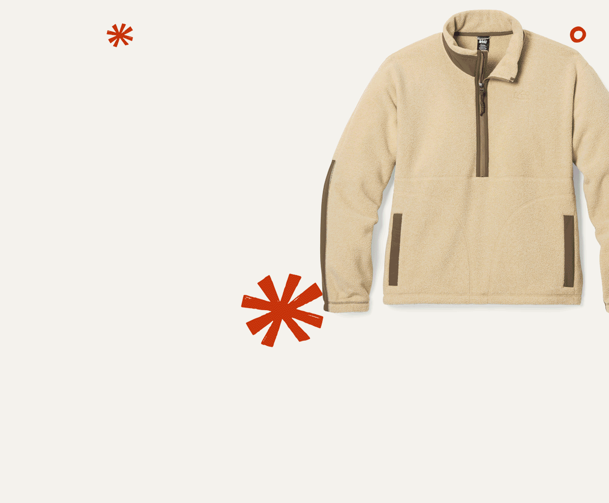 Hats, socks, gloves, a backpack, and two fleece jackets over a light colored background.