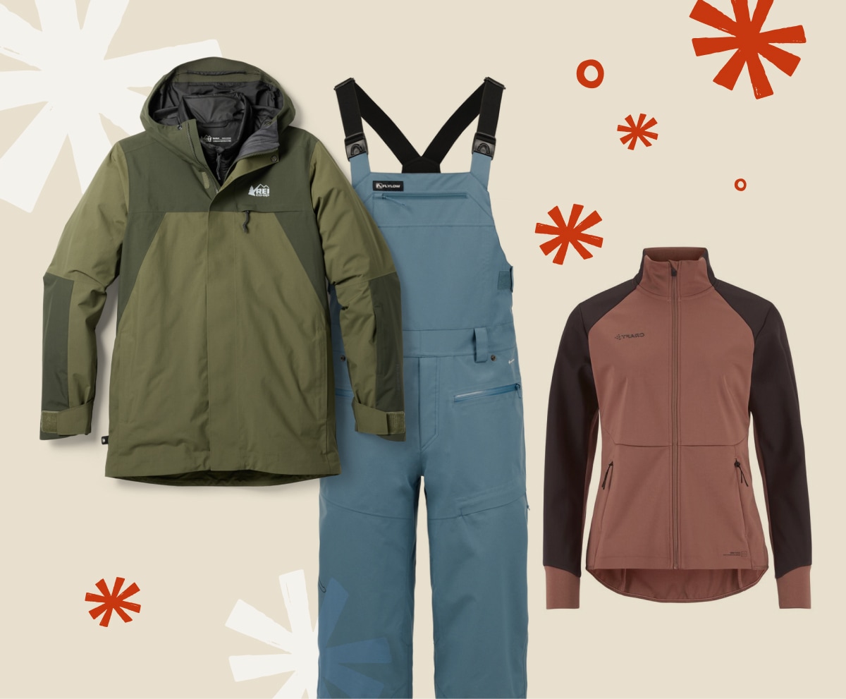A collage of Flylow, Craft, & REI Co-op brand snow clothing on a light colored background with snowflakes.