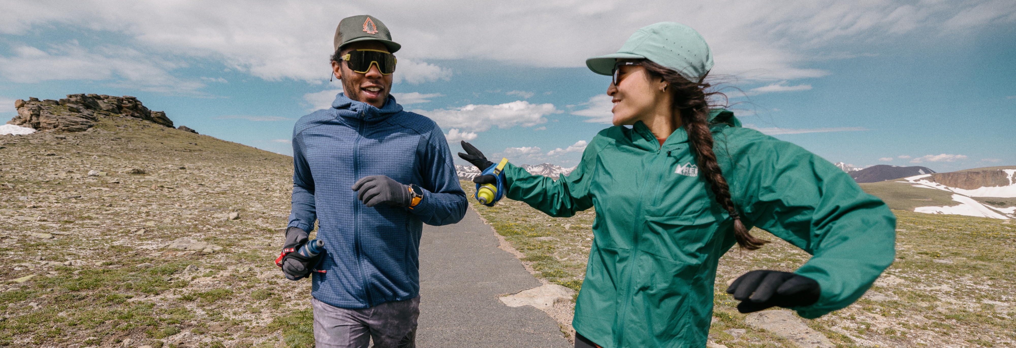 Two people having a conversation while on a run.