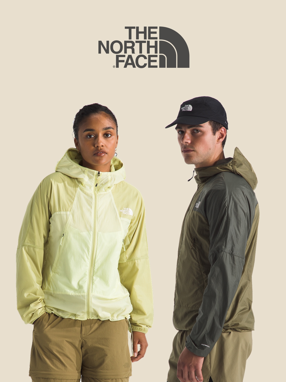 Two people wearing the new The North Face Ridgelite jacket on a light colored background.