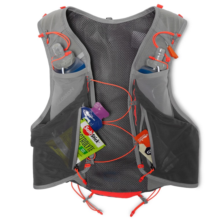 A hydration vest with water bottles, electrolytes and gels in the pockets