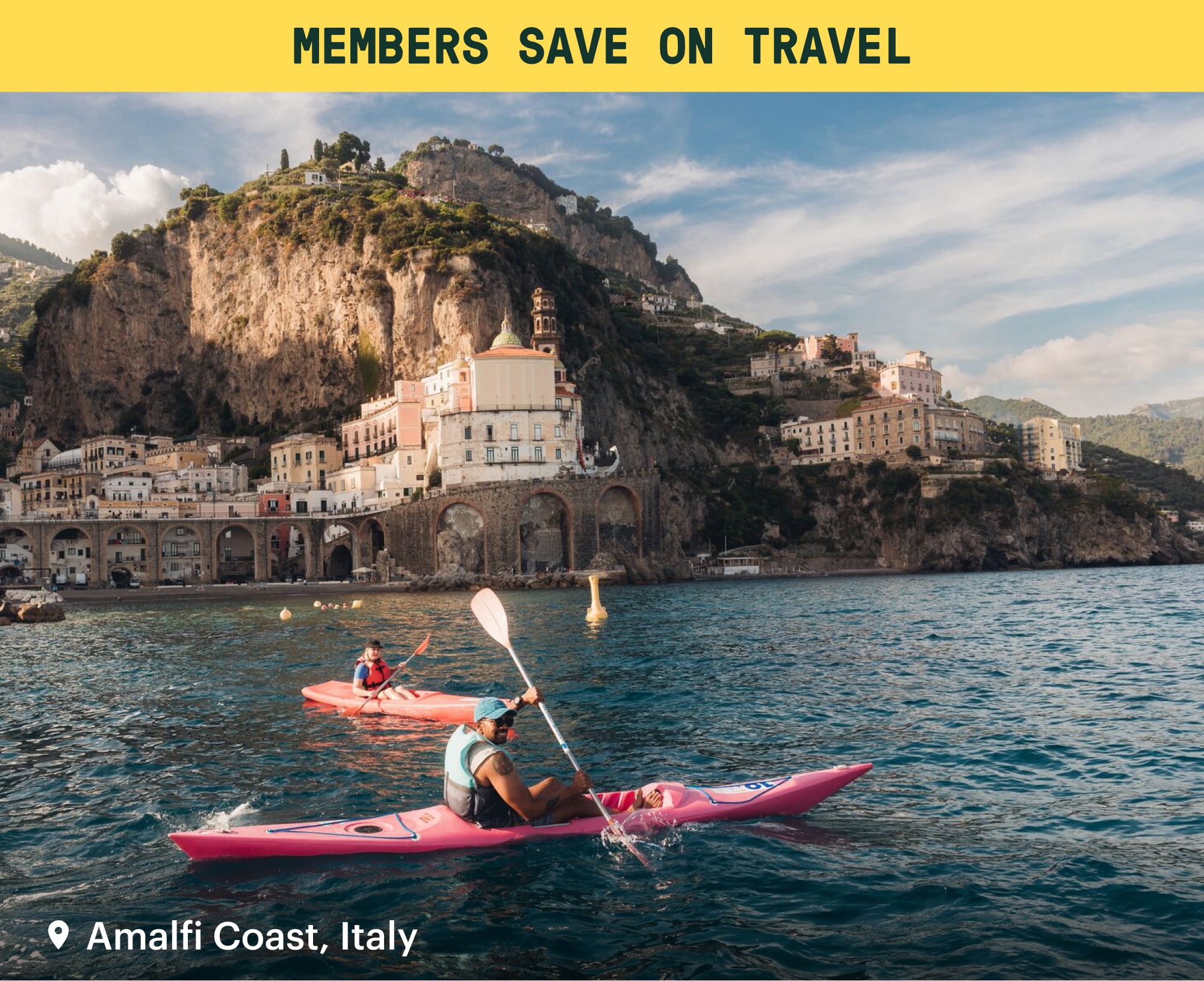 A yellow banner that reads: ‘Members save on travel’ over an image of people kayaking in the Amalfi Coast.