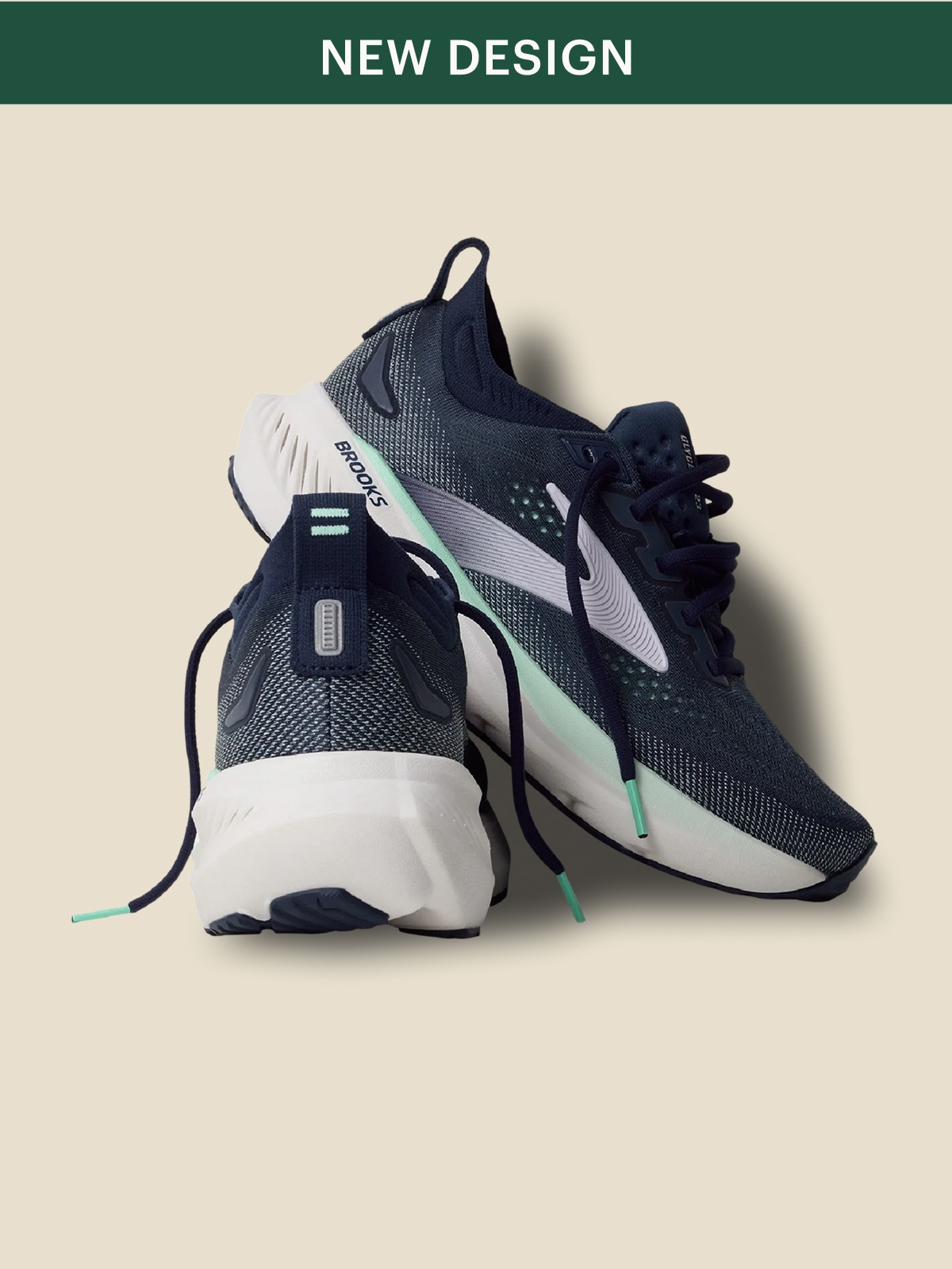 A pair of Brooks running shoes on a light colored background.