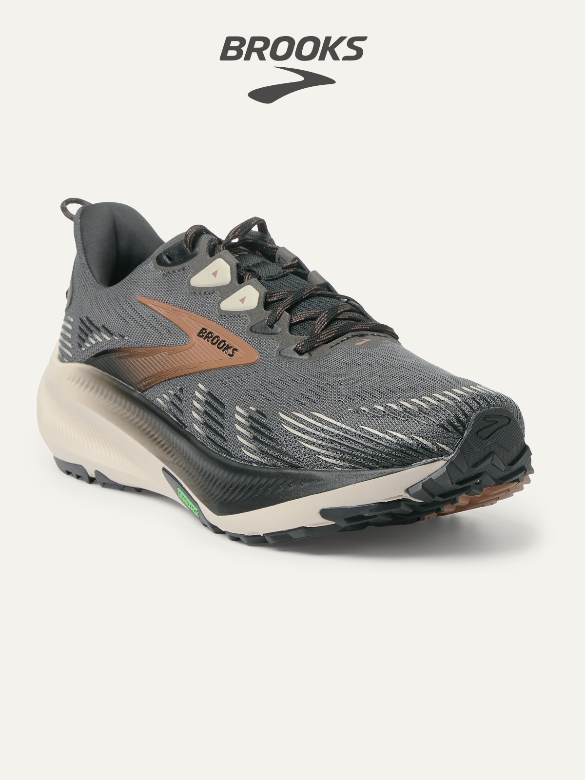 The Brooks Ghost Trail running shoe on a light colored background.