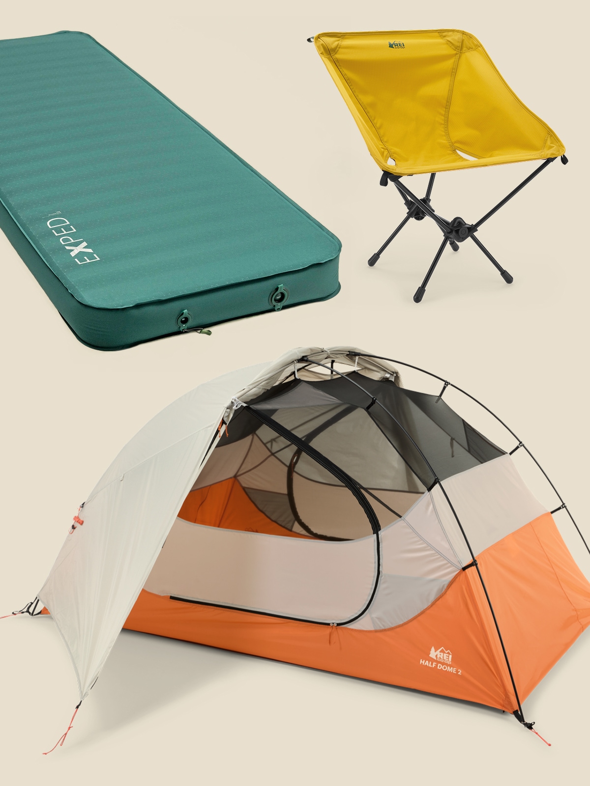 A tent, sleeping pad, & camp chair on a light colored background.