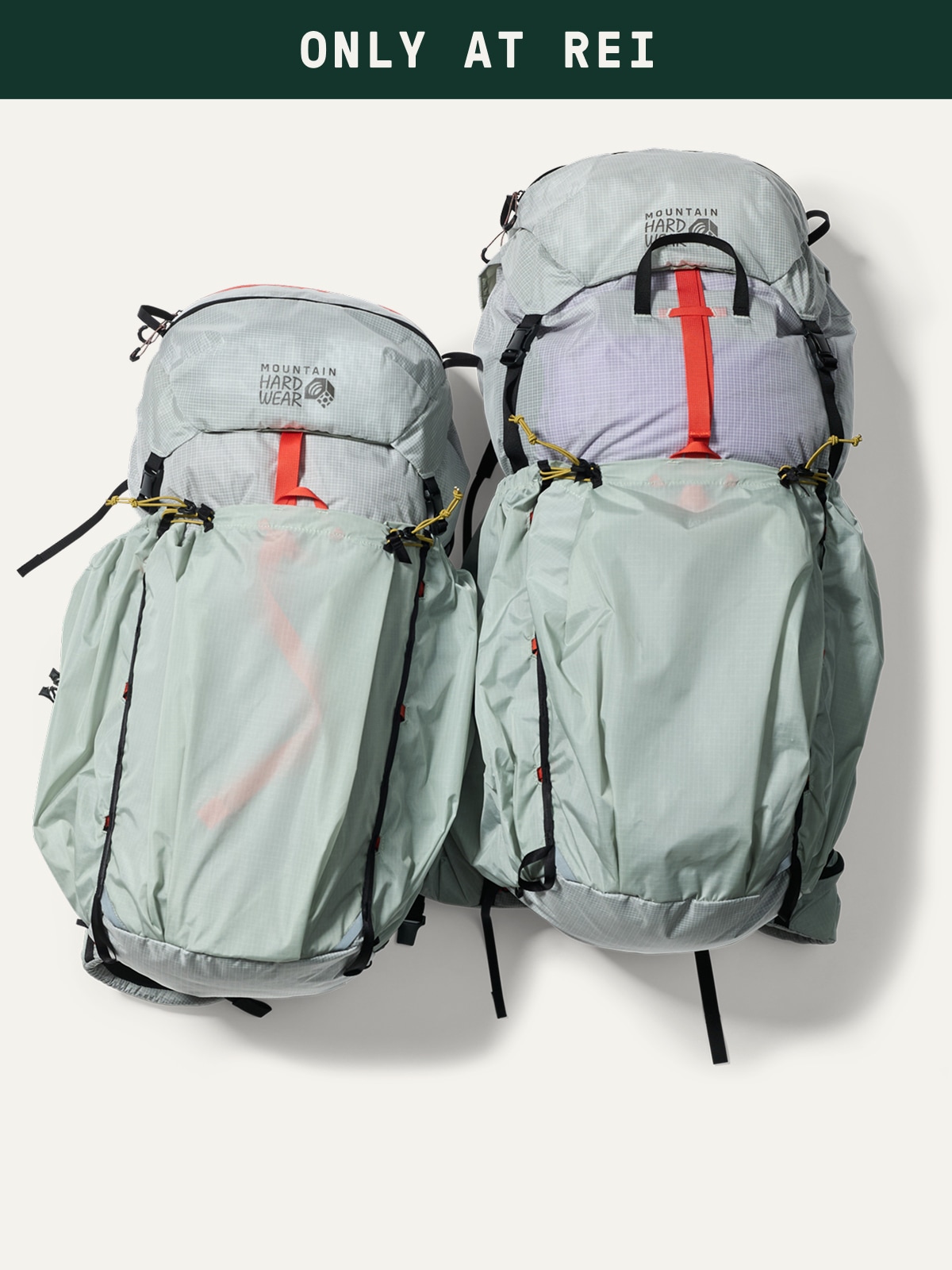 Text reads: ‘Only at R E I’ over an image of two Mountain Hardwear backpacks on a light colored background.