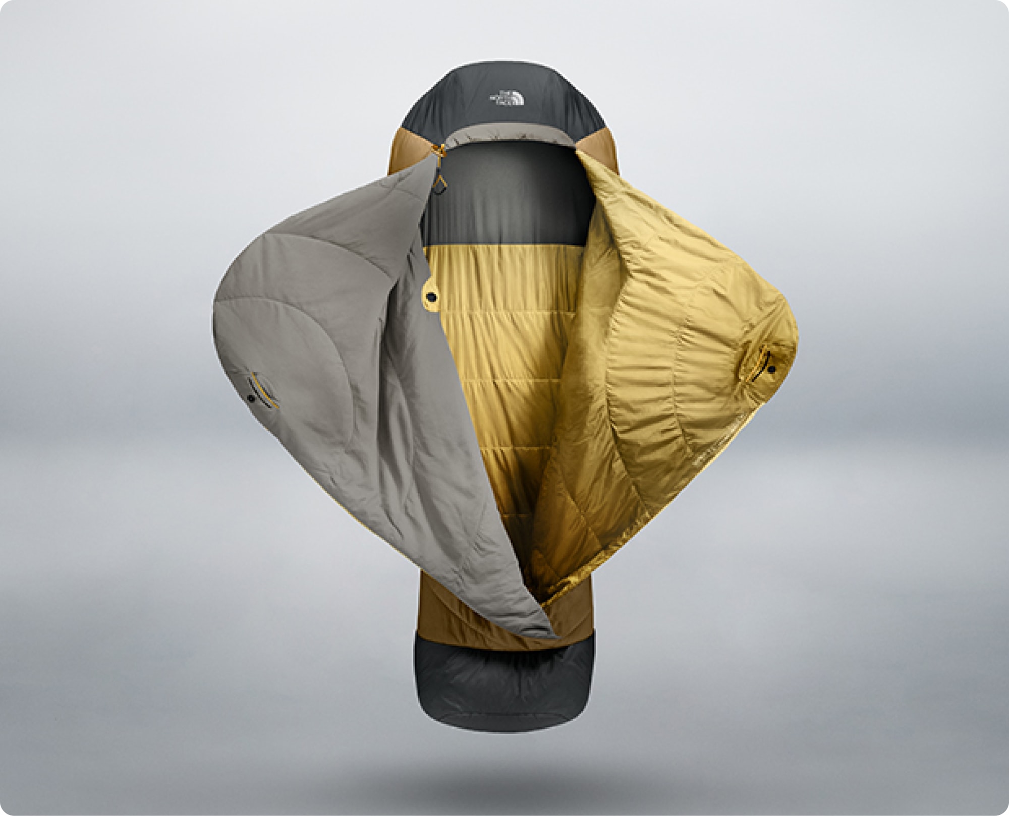 The North Face Universal One Sleeping Bag on a gray gradient background.