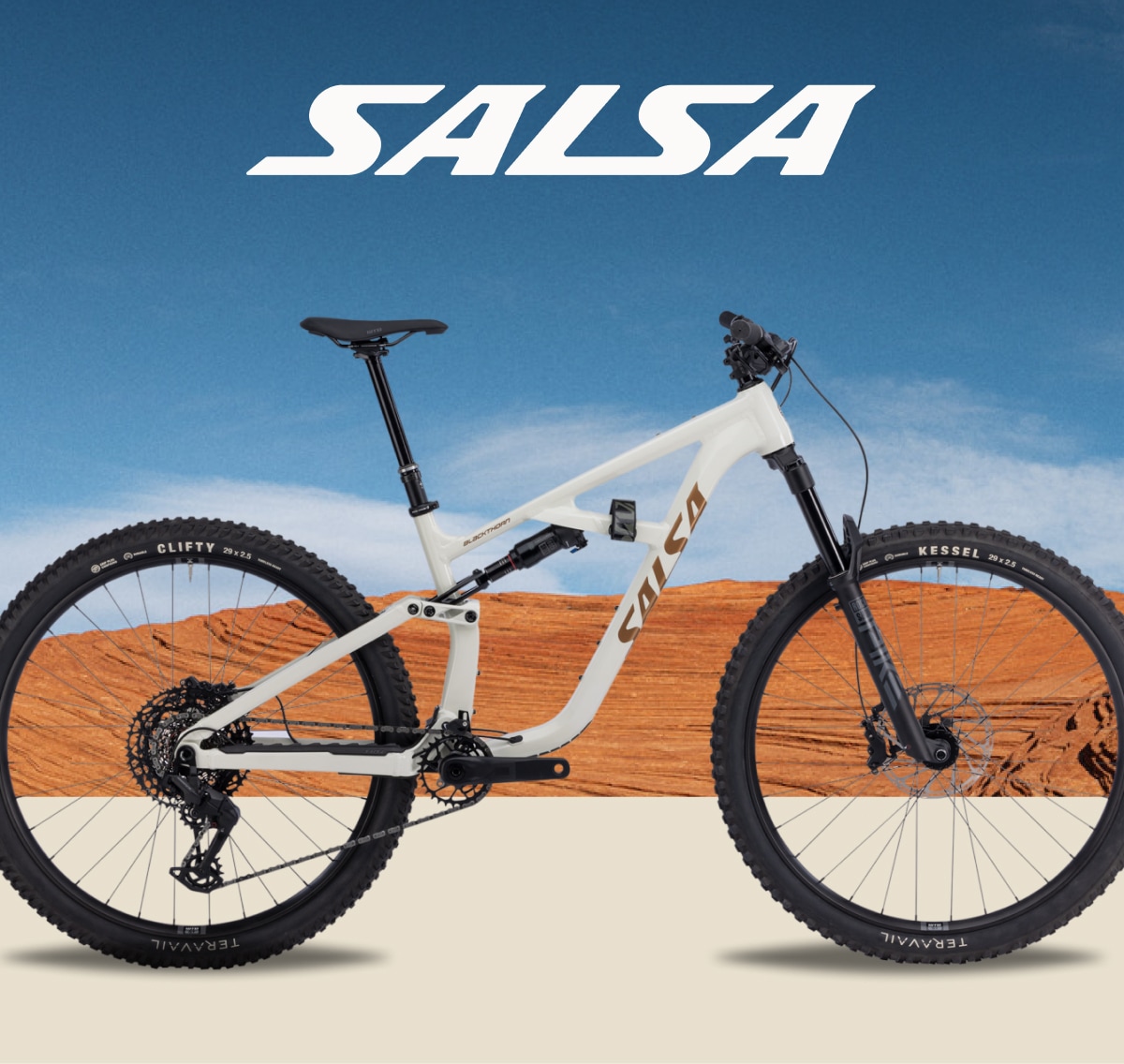 A Salsa mountain bike with an image of a canyon in the background.