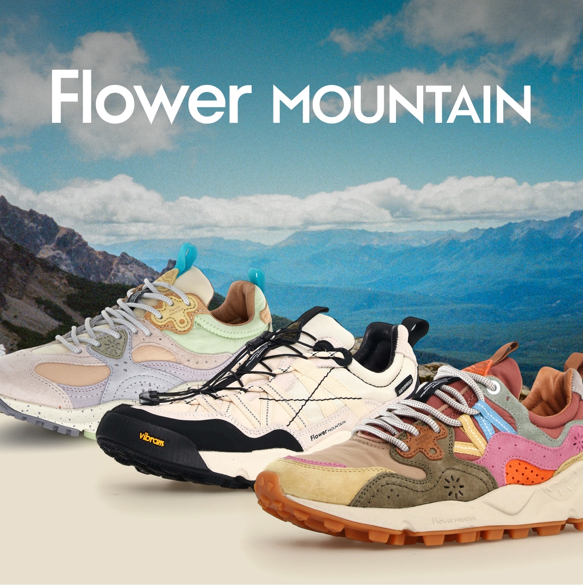 Three Flower Mountain shoes with blue skies and a mountain range in the background.