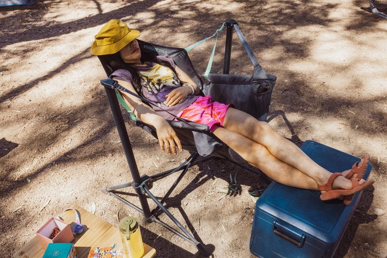 Picture of a woman reclining in a camp chair