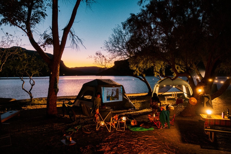 Picture of a lakeside campsite at night