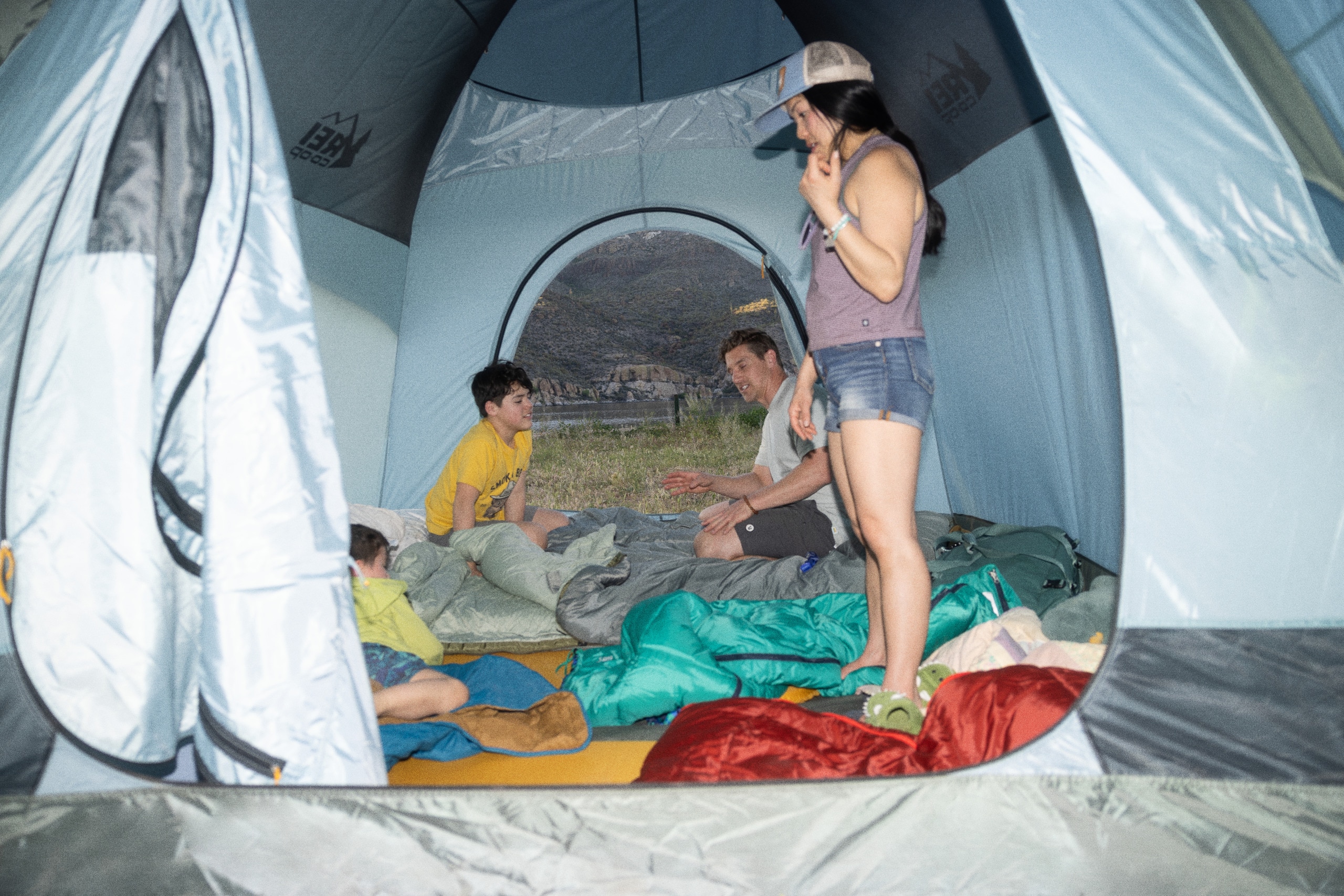 Picture of four people inside an REI Co-op Westward Tent