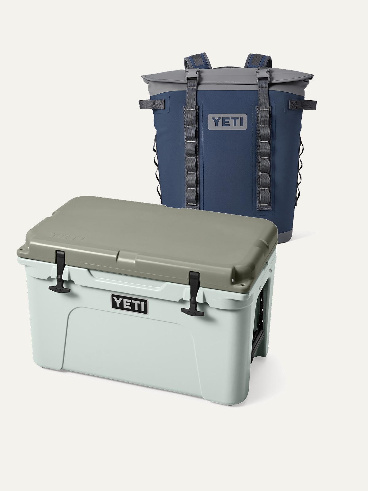 Two YETI coolers on a light colored background.