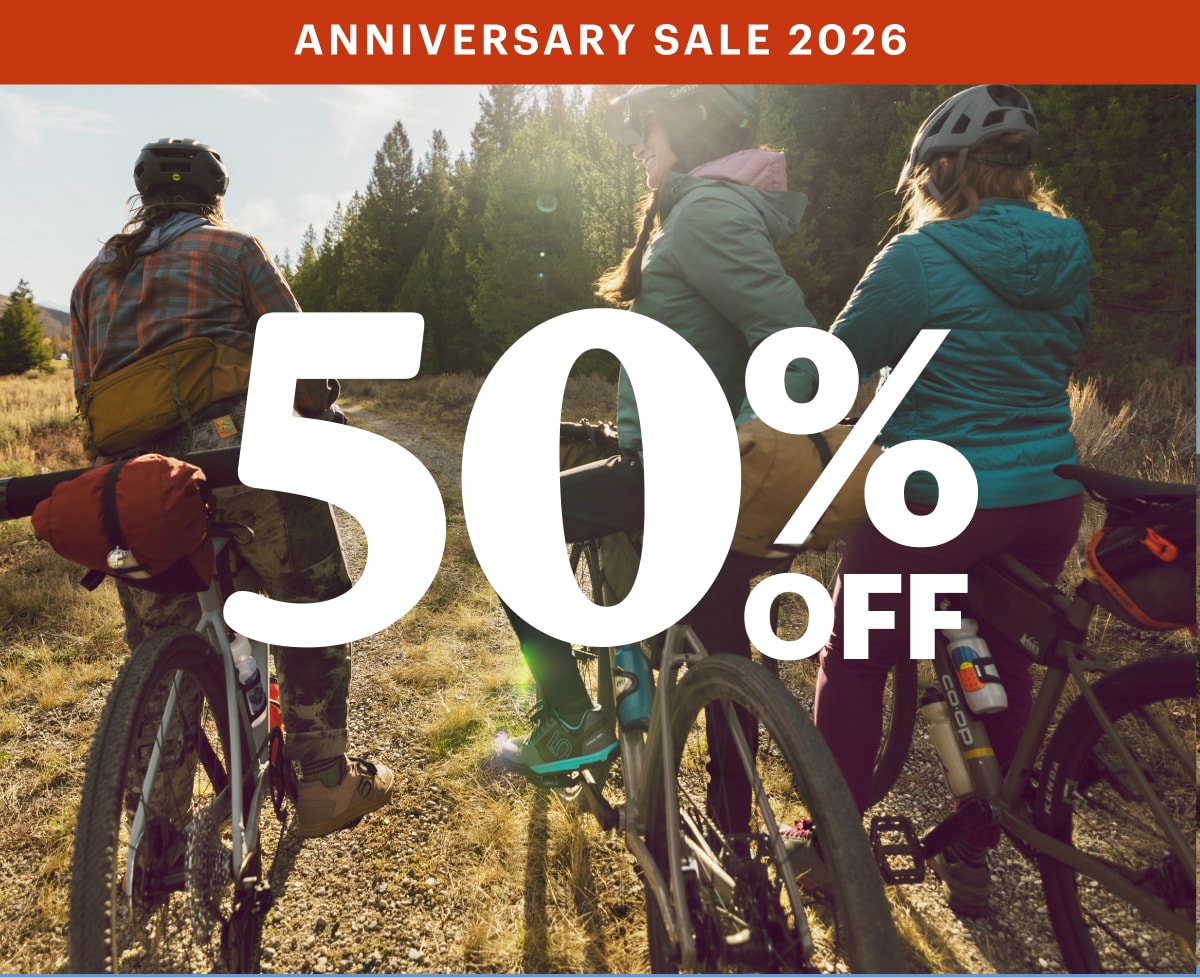 Text reads: ‘Anniversary Sale 2026’ over a photo of people on their bikes.