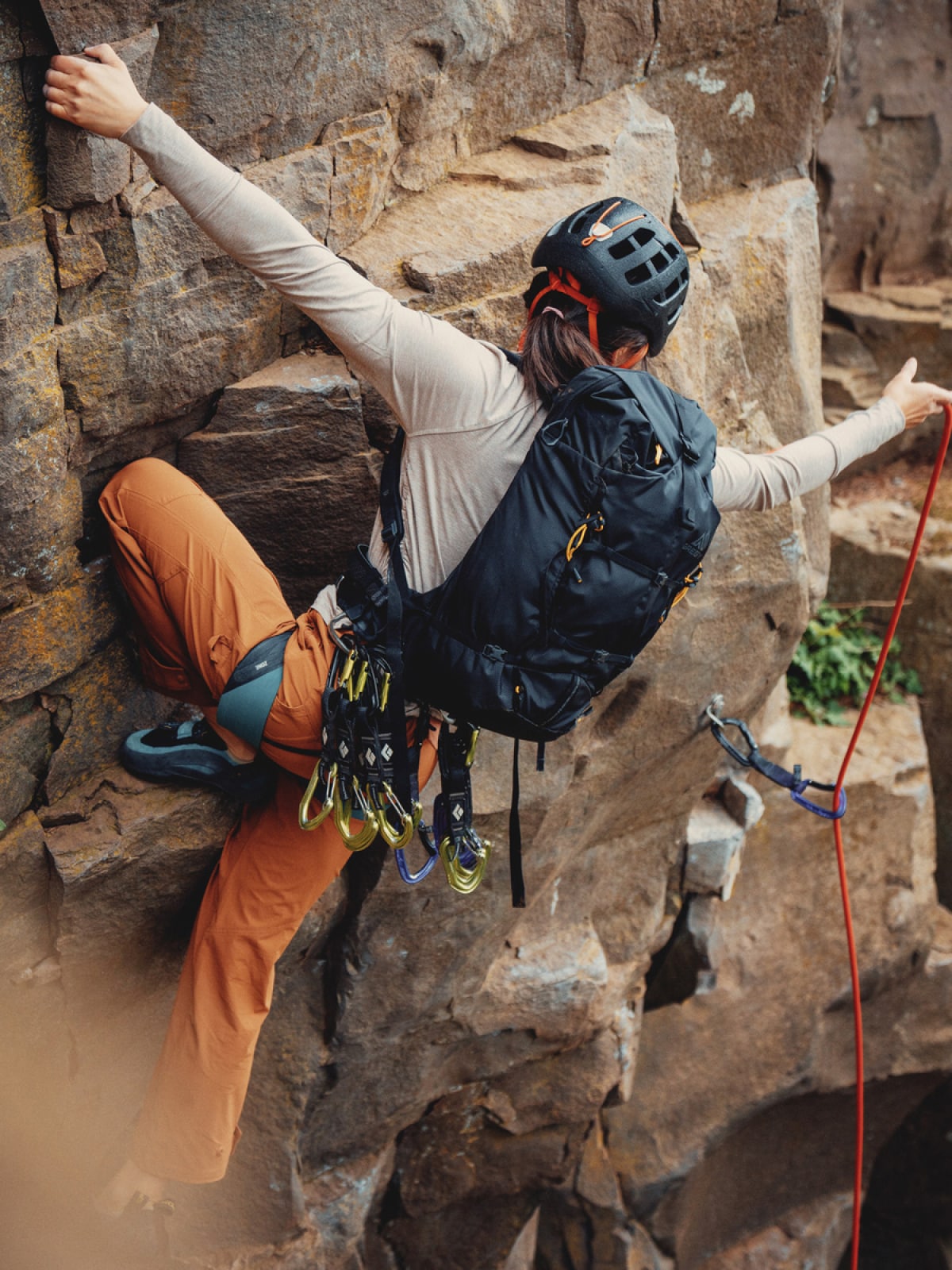 A rock climber ascending.
