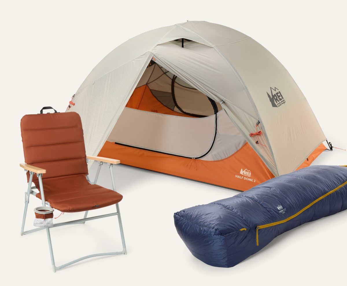 A tent, camp chair, and sleeping bag on a light colored background.