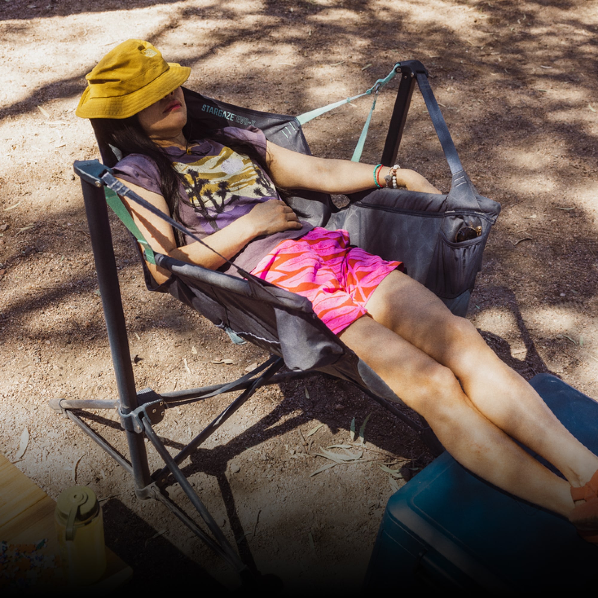 NEMO, R E I Co-op, & Coleman. A person relaxes in a NEMO Stargaze reclining camp chair.