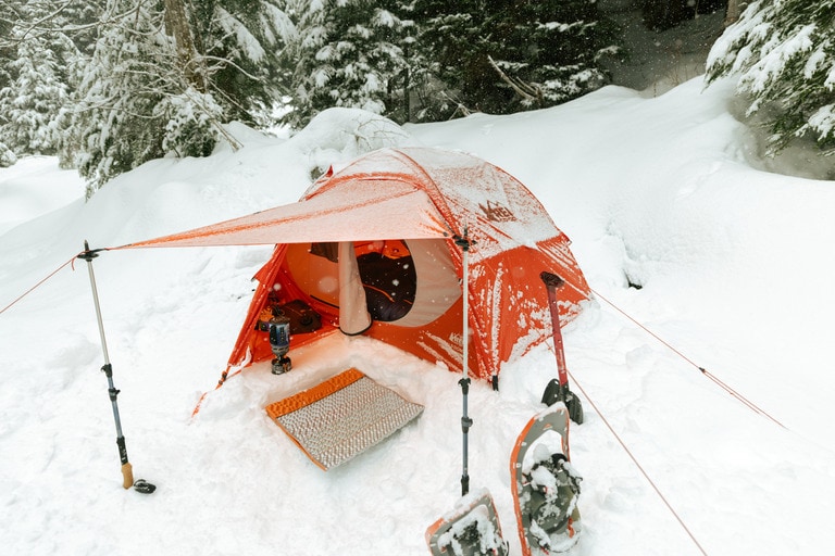 A tent pitched in snow 