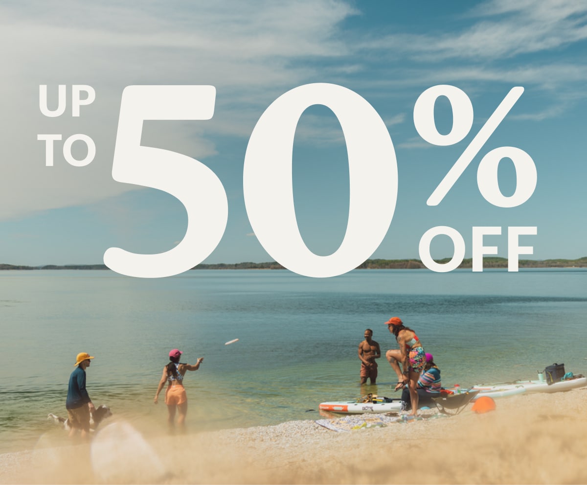 Text reads: ‘Up to 50% off’ over a photo of people enjoying a day at the lake.
