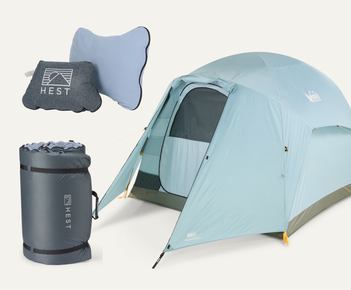 A HEST Camp Pillow and Sleeping Pad and an R E I Co-op brand tent on a light colored background.