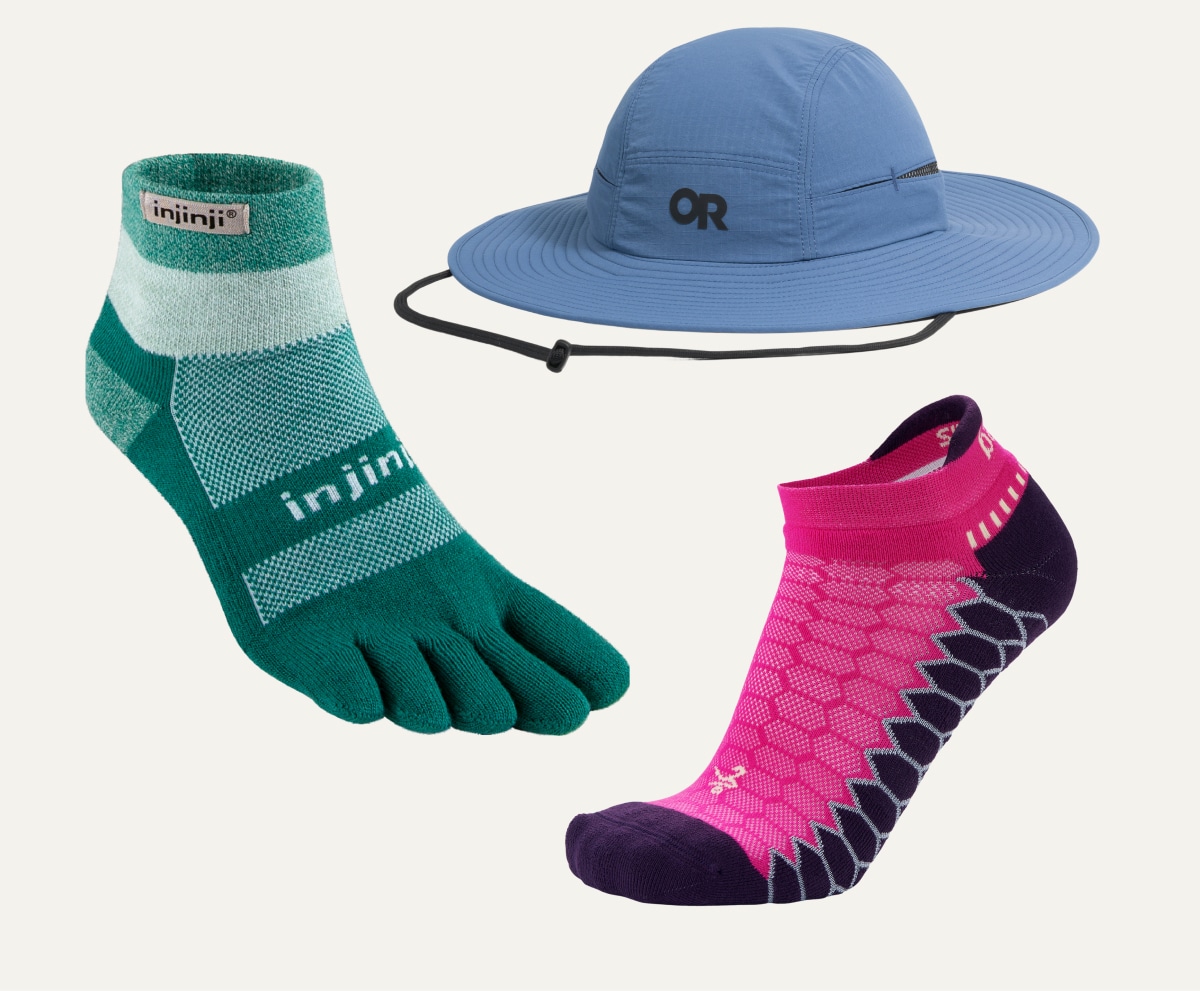 Socks and a hat on a light colored background.