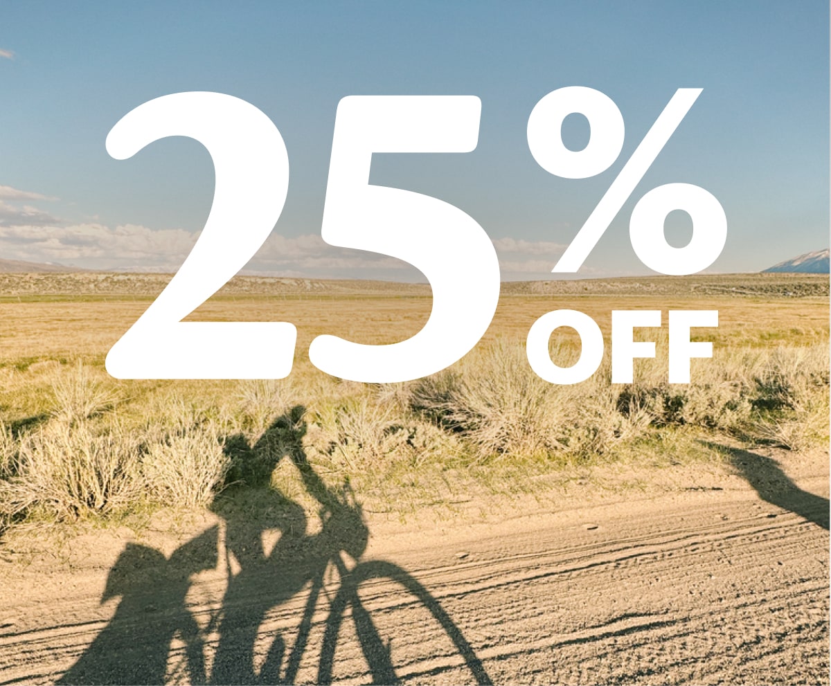 Text reads: ‘25% off’ on a photo of a shadow of someone riding their bike.