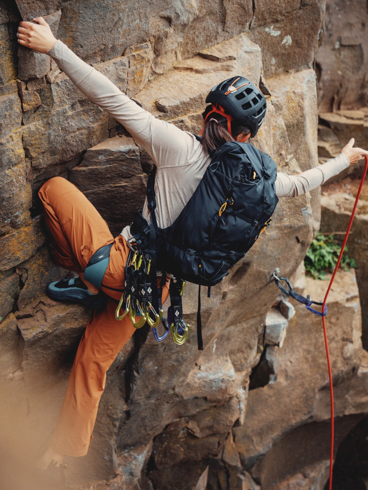 A rock climber ascending.