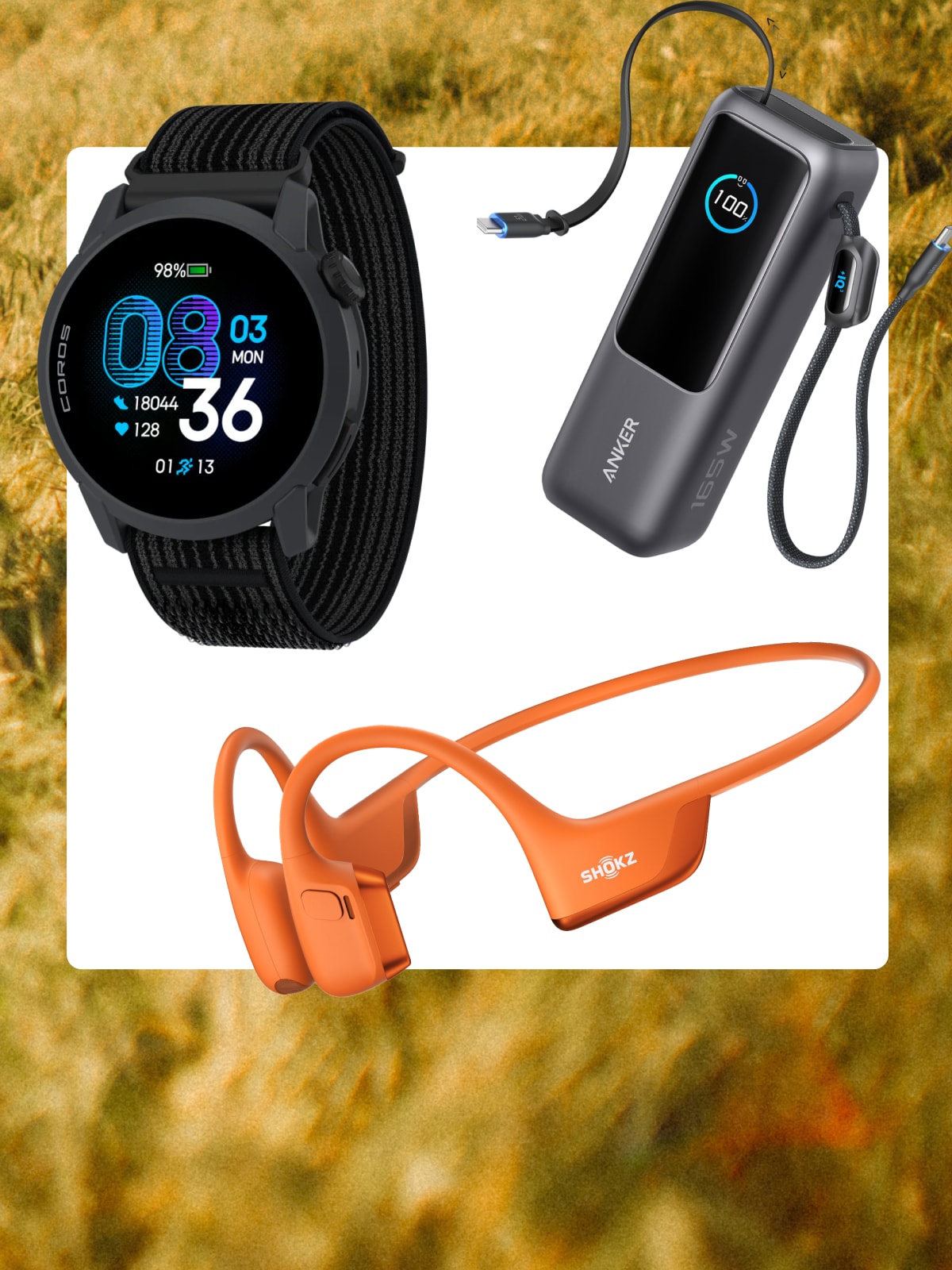 A smartwatch, a laptop power bank, and a pair of headphones on a white background over an image of leaves and grass.