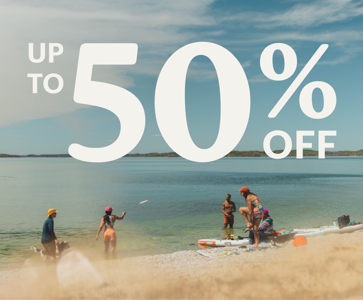Text reads: ‘Up to 50% off’ over a photo of people enjoying a day at the lake.