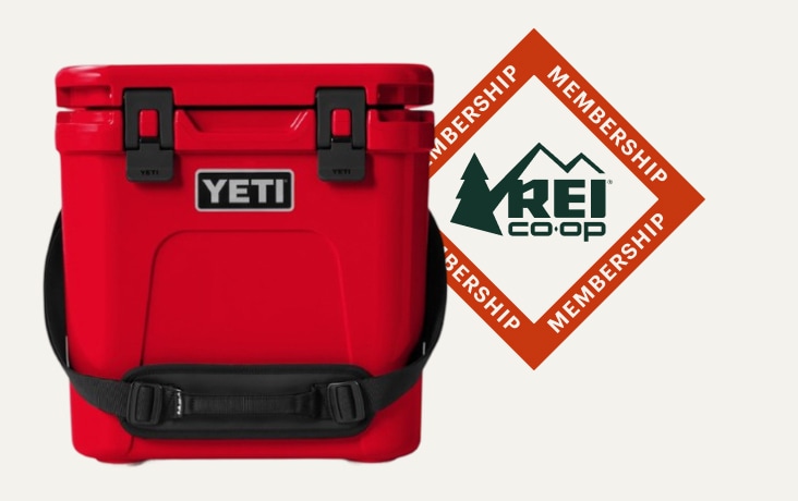 Text reads: ‘R E I Co-op membership’ next to a red YETI cooler on a light colored background.