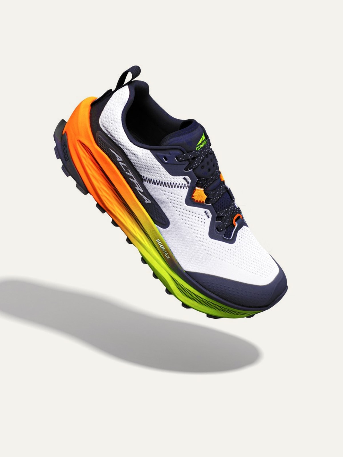An Altra trail-running shoe on a light colored background.