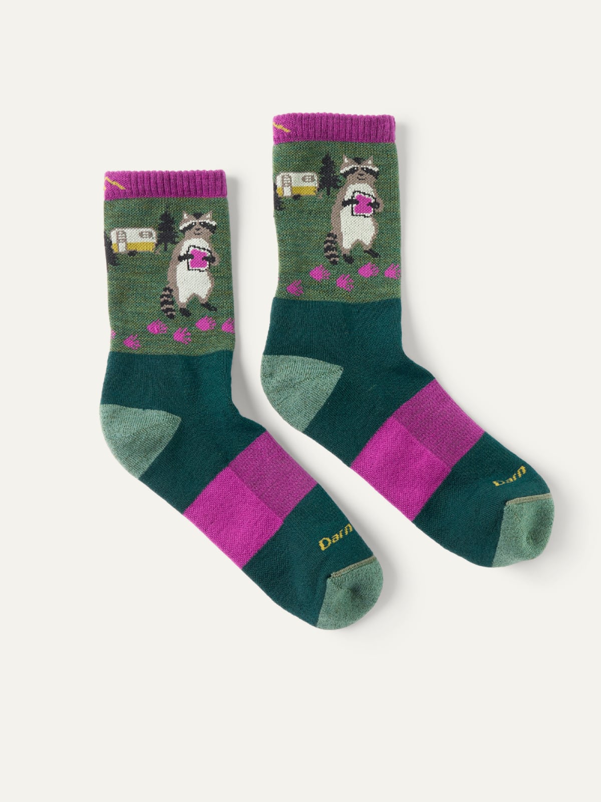 A pair of colorful Darn Tough socks on a light colored background.