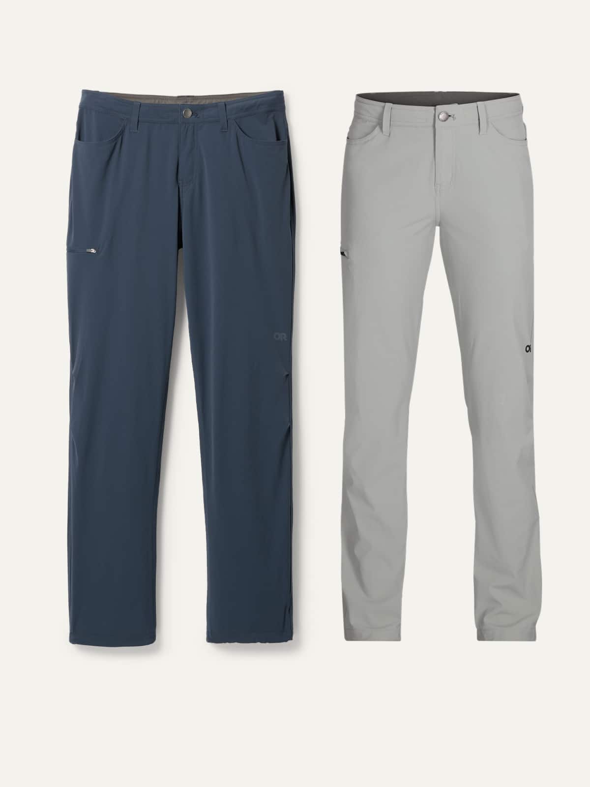 Two pairs of hiking pants on a light colored background.