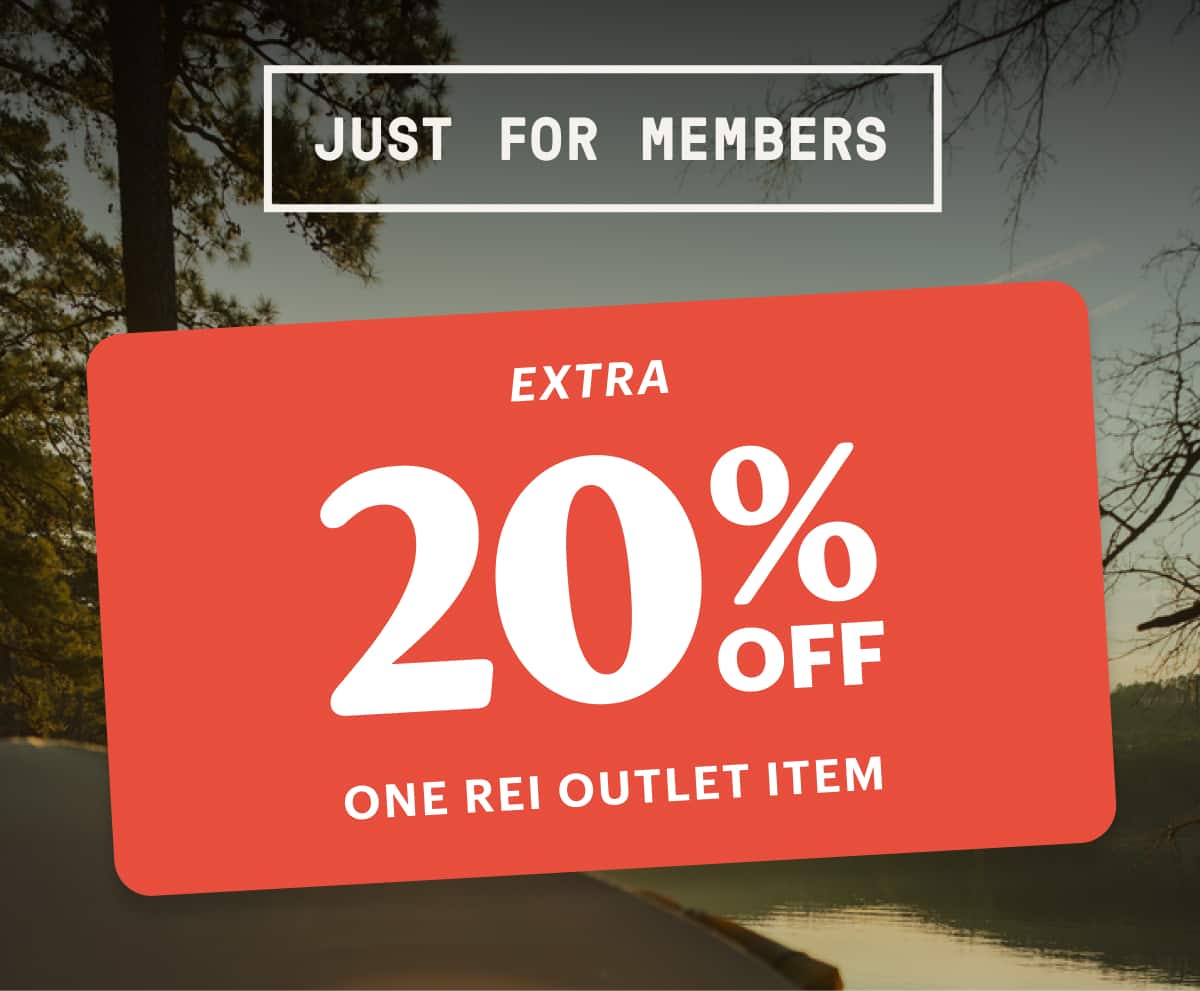 Text reads: ‘Just for members’ over an image of the sun setting over a lake with a red coupon for 20% off one R E I Outlet item.