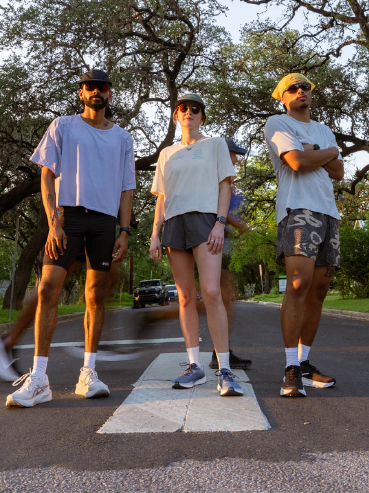 A group of people stop their run to pose for the camera. 