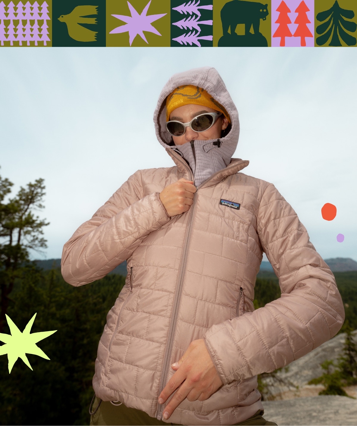 A person zips up their Patagonia jacket while on a hike.