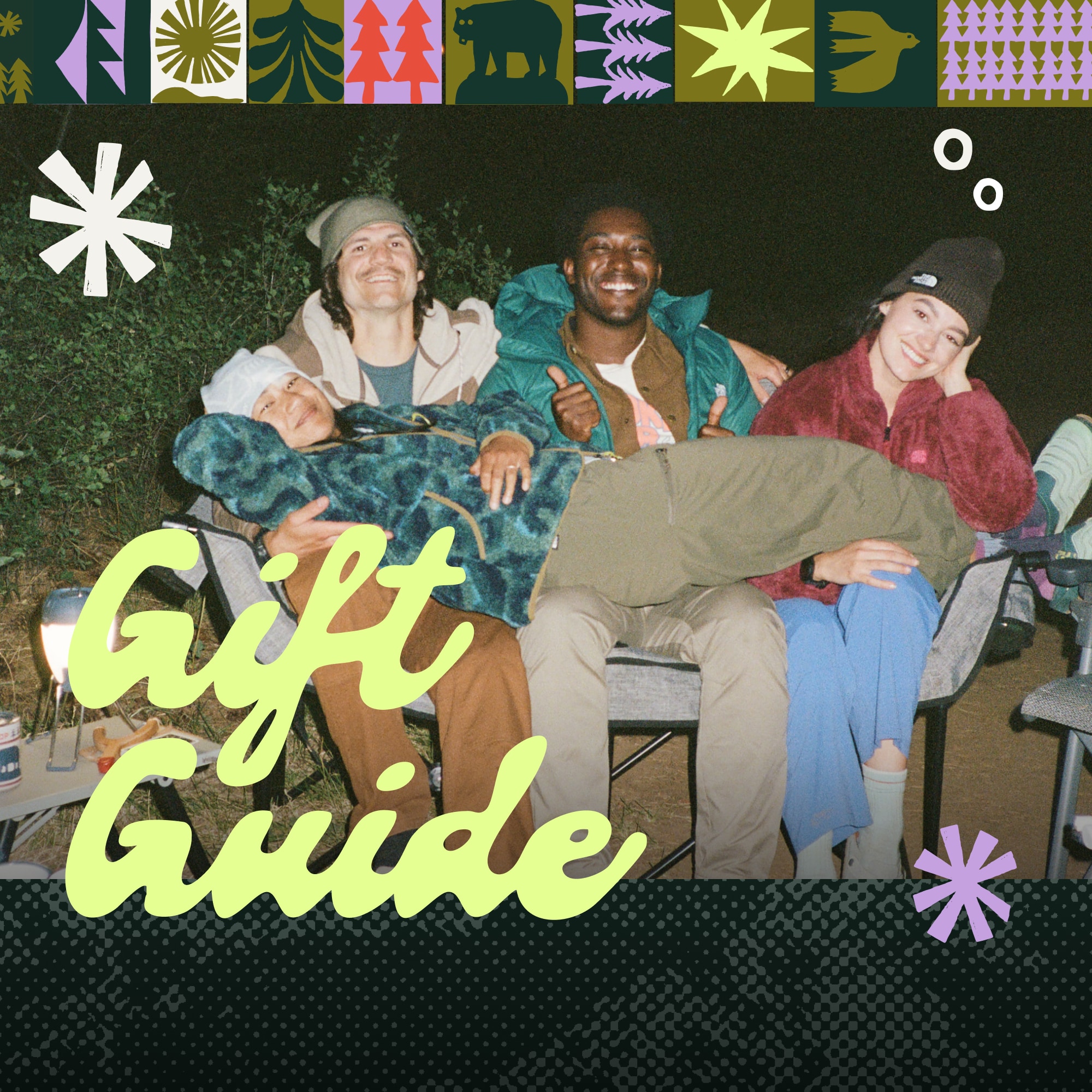 Text reads ‘Gift Guide’ over a photo of a group of campers smiling for the camera while sharing a chair.
