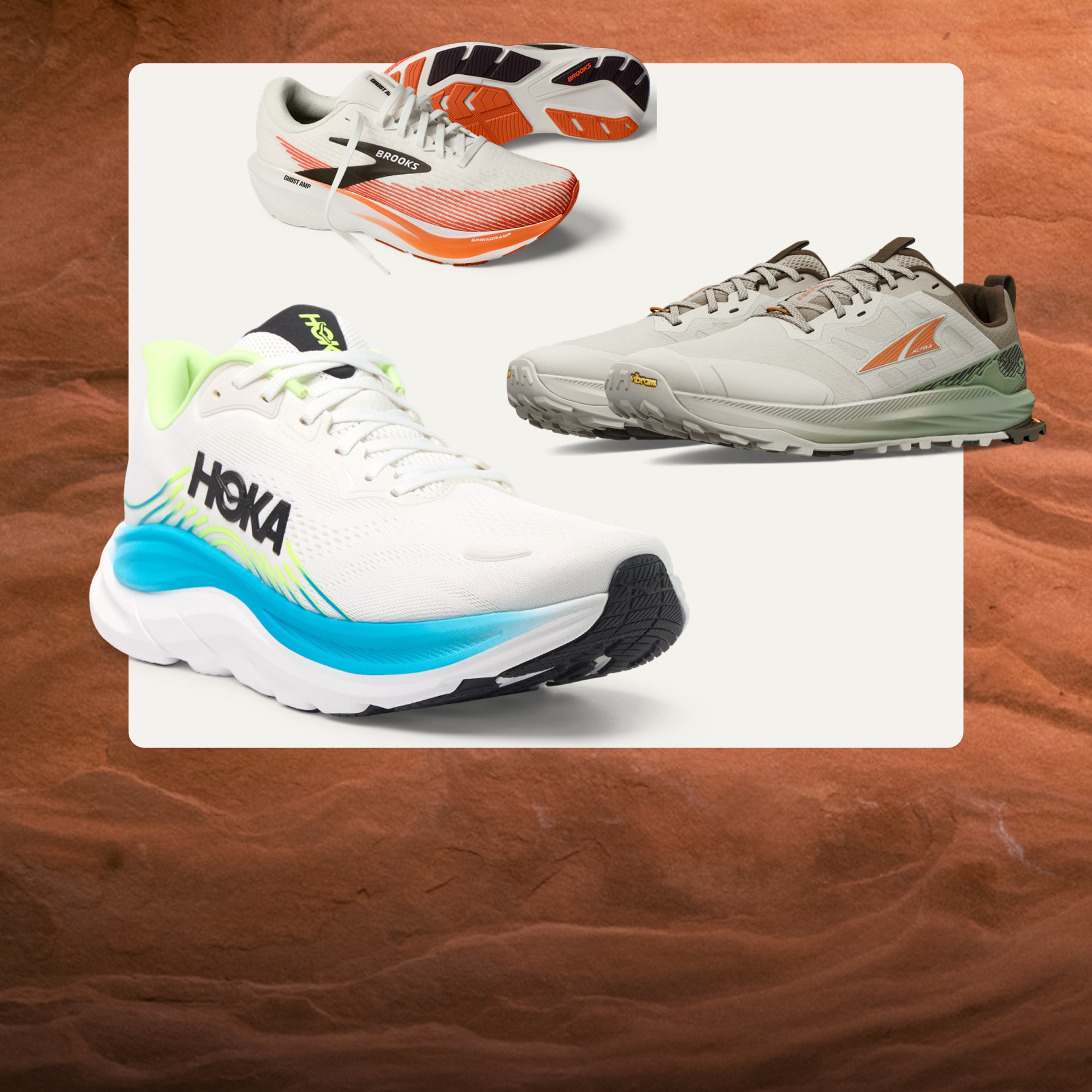 Running shoes from Brooks, Altra, & HOKA on a light colored background over a large red rock.