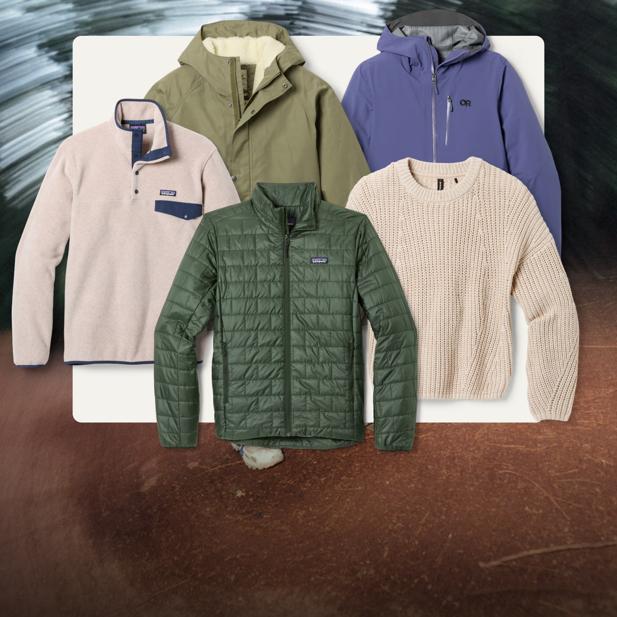 A collage of jackets and sweaters on a light colored background over an image of a dirt trail. 