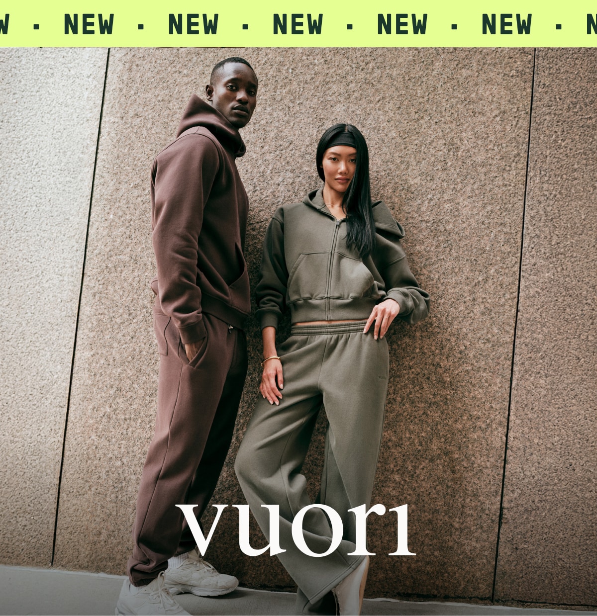 Two people wearing Vuori clothing.